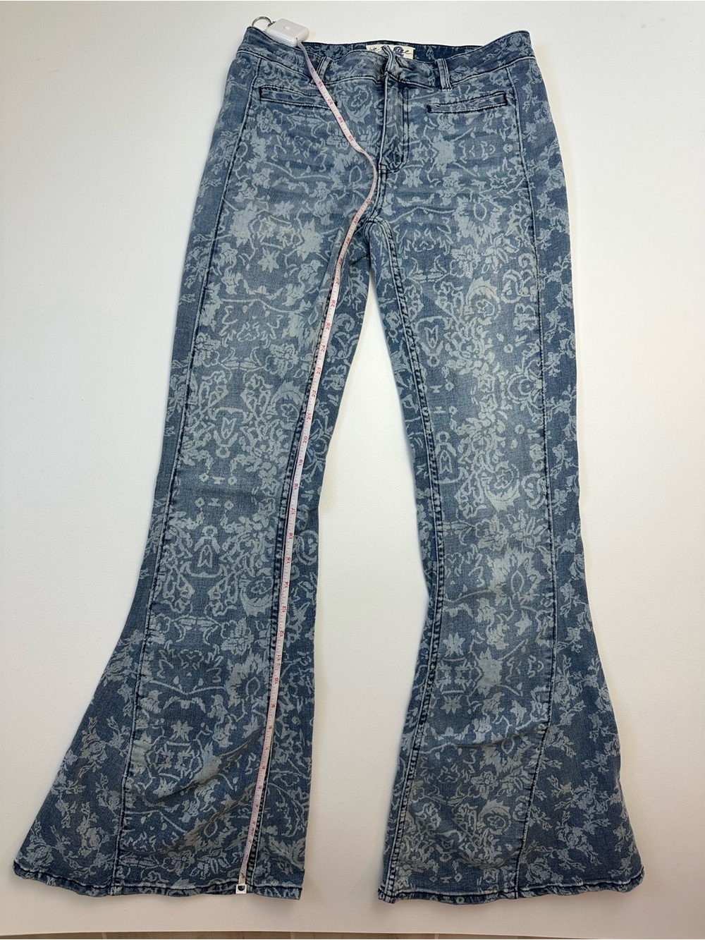 We The Free Blue Floral-Print Flare Jeans